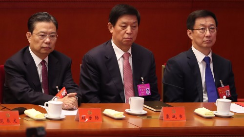 中共十九大上的赵乐际（左）和韩正（右），中为帮习近平掌全国人大推出港版国安法的栗战书。