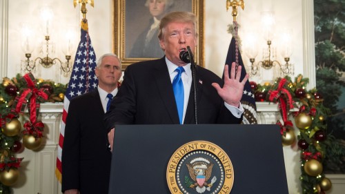 US President Donald Trump speaks alongside US Vice President Mike Pence (L) about the recognition of Jerusalem as the capital of Israel by the United States in the Diplomatic Reception Room at the White House in Washington, DC, December 6, 2017(16:9) 