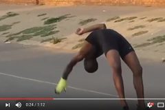 男子連續單手後空翻34次創下世界紀錄(圖)