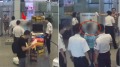 【7.25中国速瞄】广西女拒安检大闹机场(组图)