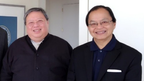 月前被捕的何志平（左）與路祥安（右）共掌中華能源基金會