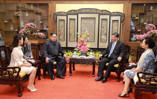 3月25日至28日，习近平在北京会见首次访华的金正恩。