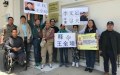 李文足徒步“千里寻夫”美国华人中领馆前声援(图)
