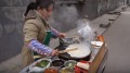 中國煎餅風靡海外有人卻要拯救它的靈魂(圖)
