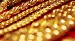 夫妻根据传说寻宝果真挖出9000颗黄金珠子(图)