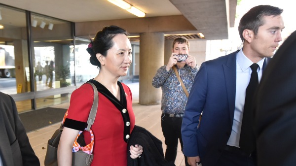 華為首席財務官孟晚舟的引渡聽證會20日在溫哥華開庭，此案涉及中、加、美三國的政治外交關係，引起全球關注。（圖片來源：DON MACKINNON/AFP/Getty Images）