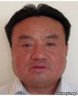 鐘丹，前中國外交官、強迫勞工案被告