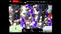 无人机拍到新疆犯人遭大规模警方押送(组图)