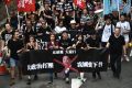 你的国庆我的游行：香港民主派抗议“威权”(图)