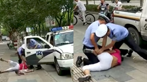 警察绊摔抱娃女子完整视频网络疯传