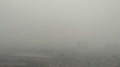 中國多地霧霾失控北京兩難題待解(組圖)