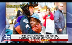 與白人警察擁抱爆紅網路的非裔男孩因SUV墜崖失蹤(組圖)