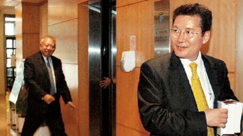 1997年陳建平出任董建華特別助理