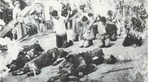 1968年8月5日“四二二”派的解放路据点被攻破后，“广州照相馆”门前人员被枪杀的情景。