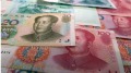 北京減緩人民幣貶值分析會不會破7(圖)