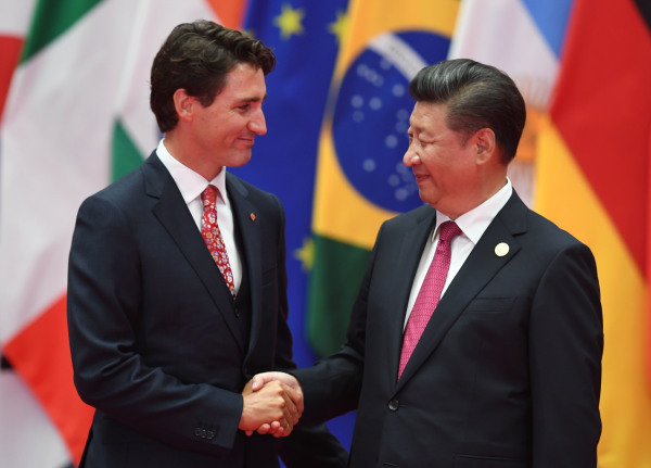 2016年9月4日，加拿大總理特魯多與習近平在杭州舉行的G20峰會握手。
