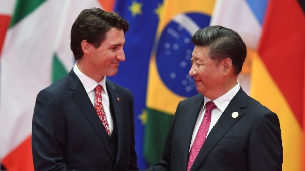 2016年9月4日，加拿大總理特魯多與習近平在杭州舉行的G20峰會握手。