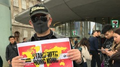 丹麦成功商人蒙面抗议“禁蒙面法”(组图)