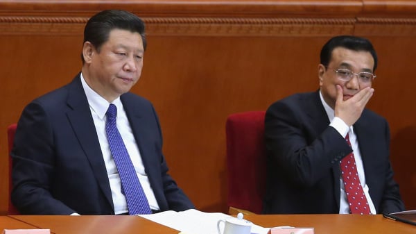 习近平和总理李克强分别发声，试图安抚国际资本在中国的贸易和投资。
