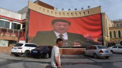 北京为新疆不惜杠上全球专家揭内幕(图)