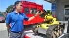 国内首部消防机器人水柱射程达65公尺(视频)