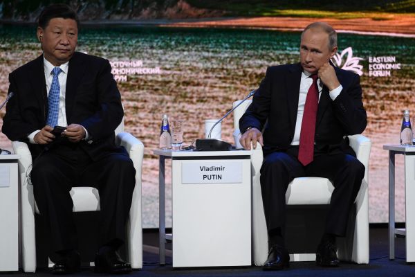 中國國家主席習近平（左）和俄羅斯總統普京（右）。（圖片來源：KIRILL KUDRYAVTSEV/AFP/Getty Images）