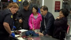 美女導遊帶團到澳洲團友順利過關導遊卻被當場遣返(組圖)