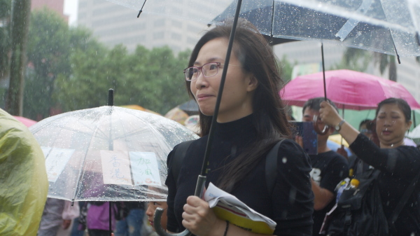 台港遊行大雨滂沱卻澆不息台灣人撐港的決心