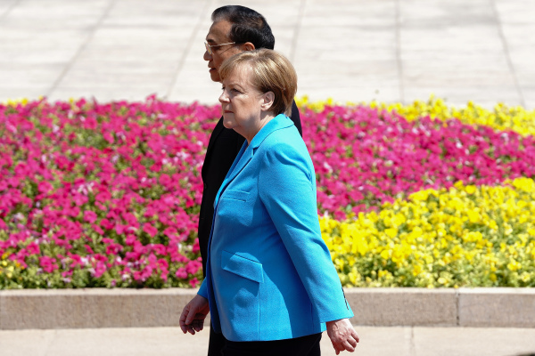 2018年5月24日，李克强在北京欢迎德国总理默克尔访华。
